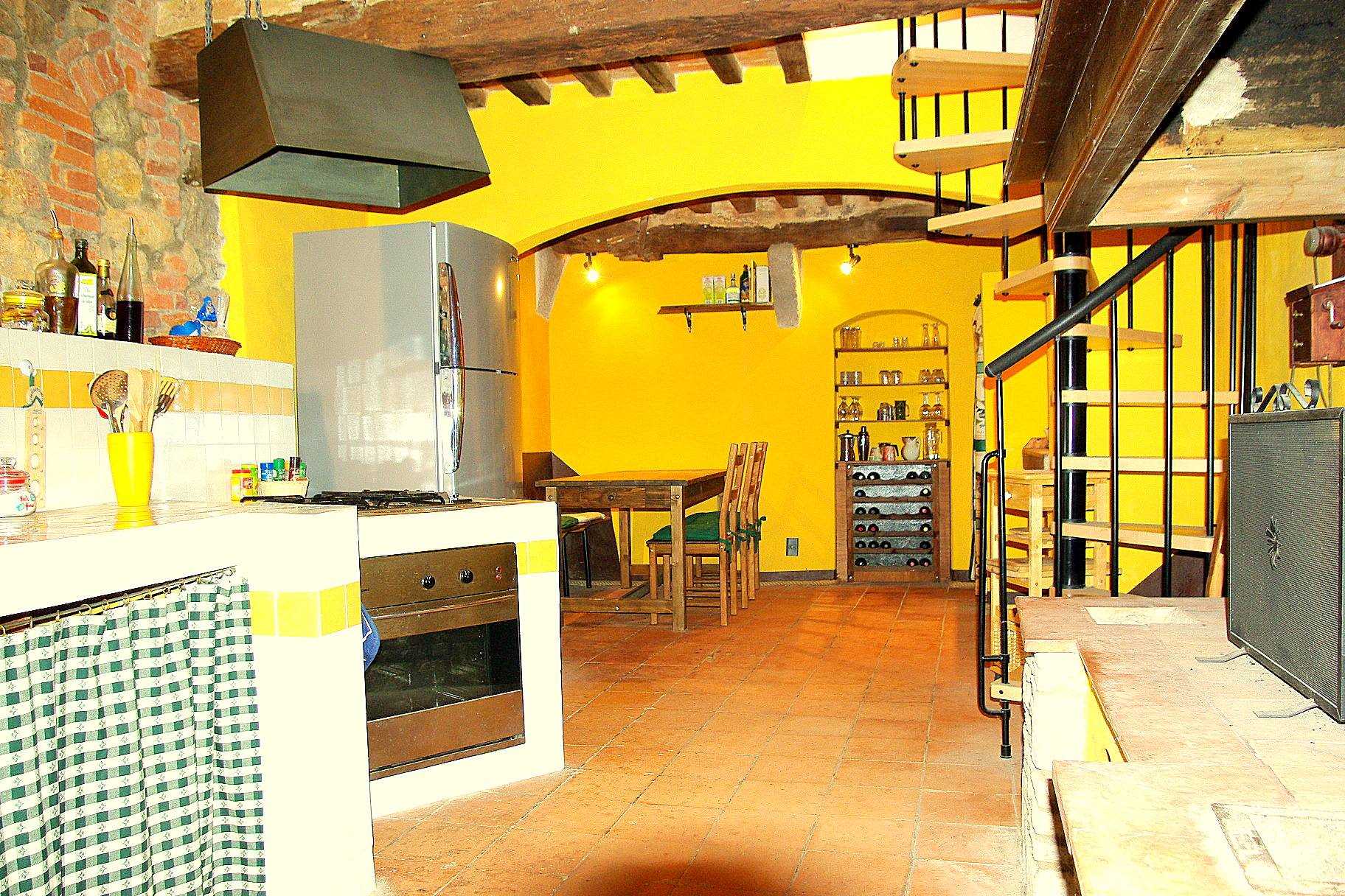 The proposed apartment is located in the heart of the medieval village of Montepescali, a short walk from the parking lot in the square of the Church 