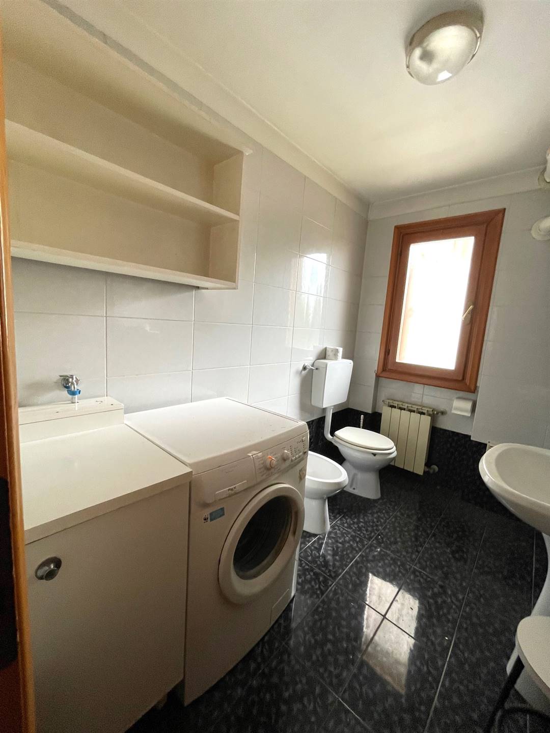 Bagno lavanderia appartamento Concordia Sagittaria