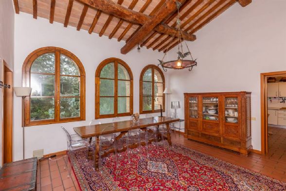 South of Siena, a few kilometers from the center, characteristic two-level country house with surrounding garden, outbuilding and wood oven. The 