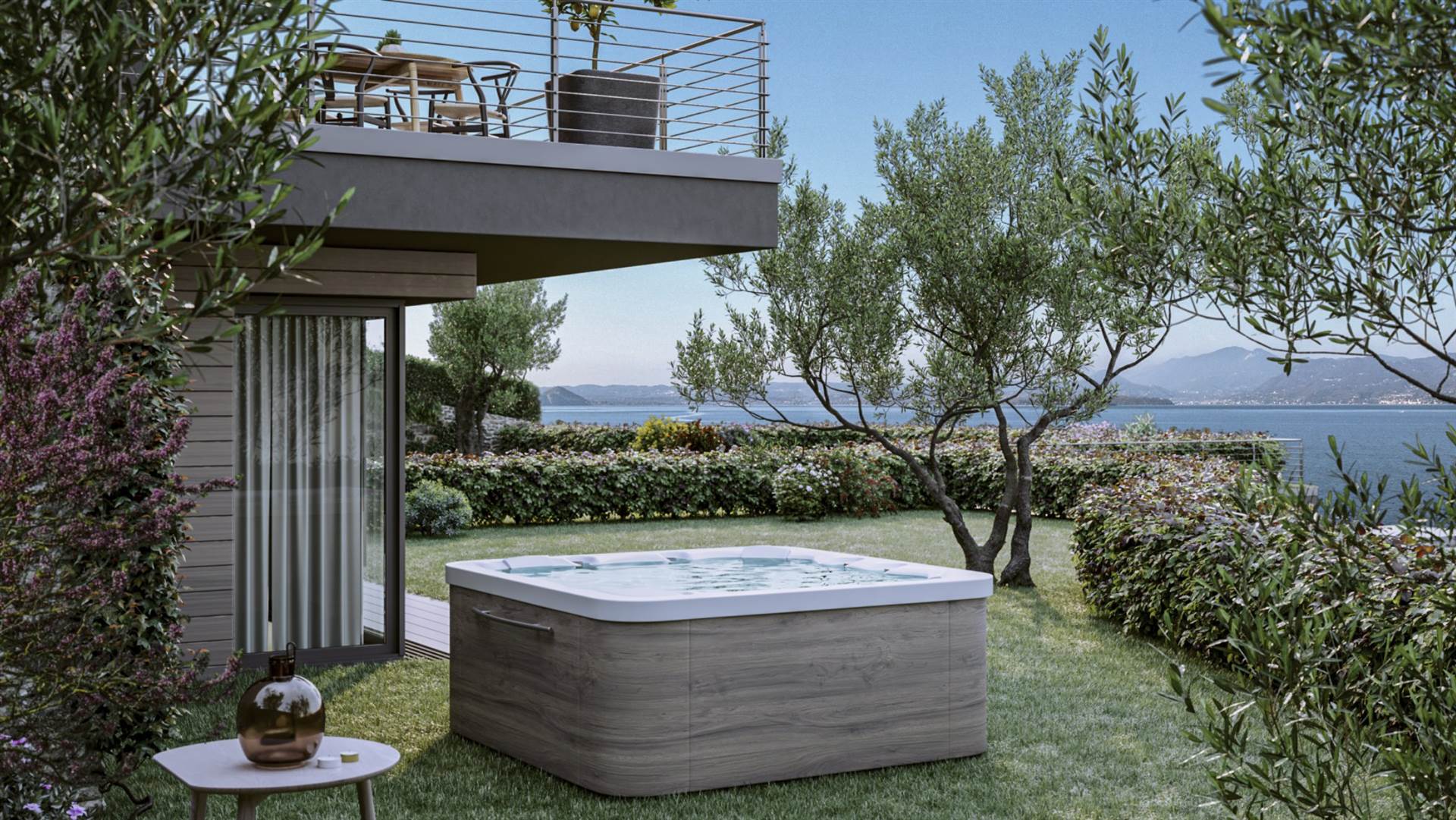 On the east side of Lake Garda, in a lakefront location between Torri del Benaco and Garda, a Residence with modern design and a wonderful 180° view 